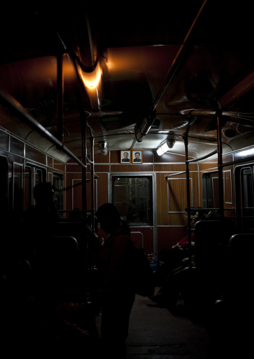 Official portraits of the Dear Leaders in a subway wagon, Pyongan Province, Pyongyang, North Korea