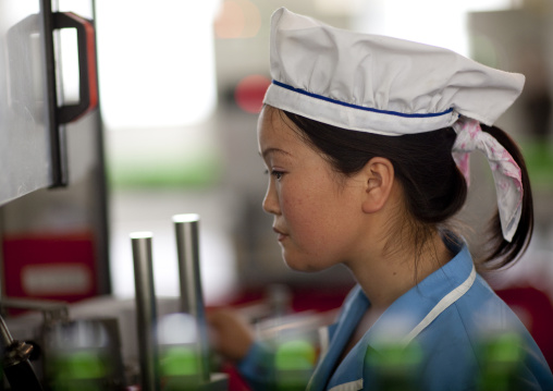 North Korean female worker in kangso yaksu mineral water factory, South Pyongan Province, Nampo, North Korea