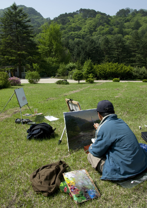 North Korean art student painting in a park, North Pyongan Province, Myohyang-san, North Korea