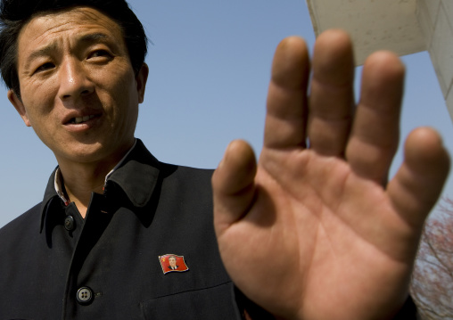 North Korean man refusing to be taken in picture, South Pyongan Province, Nampo, North Korea