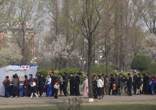 North Korean people queuing to buy some food in a small shop, Pyongan Province, Pyongyang, North Korea