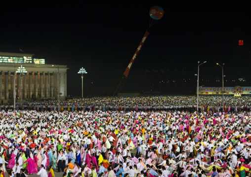 North Korean students dancing to celebrate april 15 the birth anniversary of Kim Il-sung on Kim il Sung square, Pyongan Province, Pyongyang, North Korea