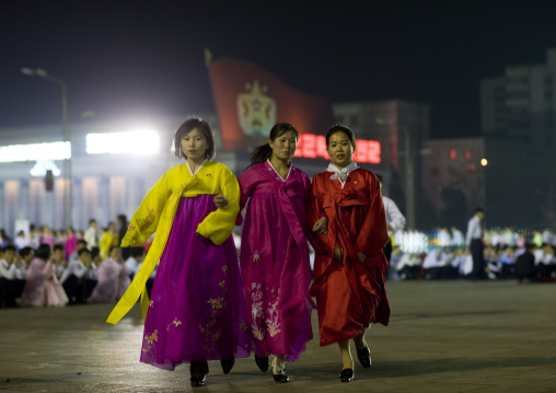 North Korean students dancing to celebrate april 15 the birth anniversary of Kim Il-sung on Kim il Sung square, Pyongan Province, Pyongyang, North Korea