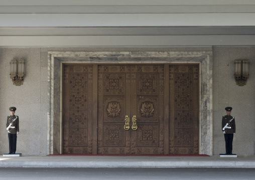 North Korean guards with silver kalashnikov at the entrance of the the international friendship exhibition, Hyangsan county, Mount Myohyang, North Korea