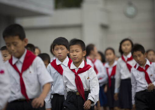 North Korean pioneers going to pay respect to the Dear Leaders at Mansudae art studio, Pyongan Province, Pyongyang, North Korea