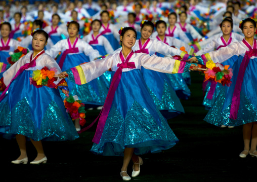 North Korean women dancing in choson-ot during the Arirang mass games in may day stadium, Pyongan Province, Pyongyang, North Korea