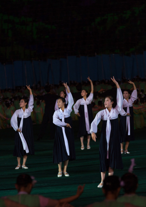 North Korean women dancing in choson-ot during the Arirang mass games in may day stadium, Pyongan Province, Pyongyang, North Korea