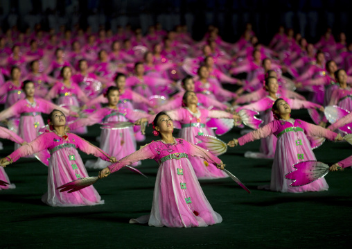 North Korean women dancing in choson-ot during the Arirang mass games in may day stadium, Pyongan Province, Pyongyang, North Korea