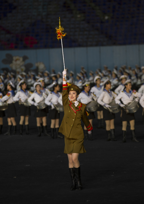 Sexy North Korean women dressed as soldiers dancing with swords during the Arirang mass games in may day stadium, Pyongan Province, Pyongyang, North Korea