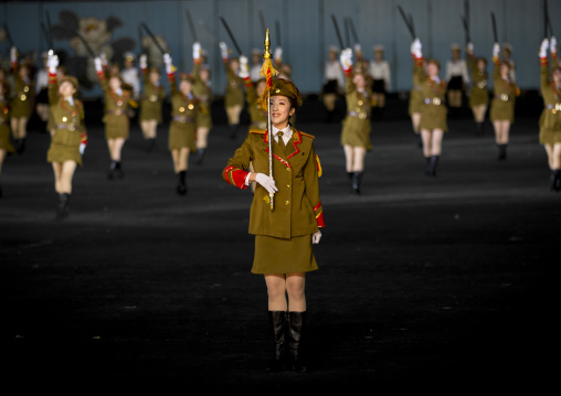 Sexy North Korean women dressed as soldiers dancing with swords during the Arirang mass games in may day stadium, Pyongan Province, Pyongyang, North Korea