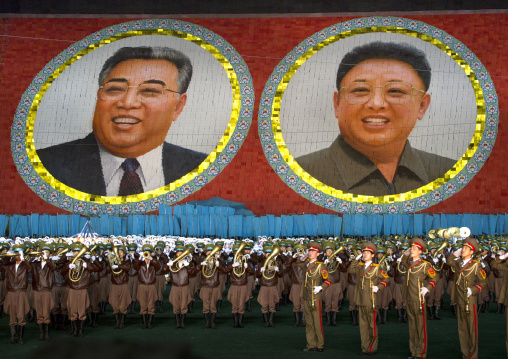 Kim il Sung and Kim Jong il portraits made by children pixels holding up colored boards during Arirang mass games in may day stadium, Pyongan Province, Pyongyang, North Korea