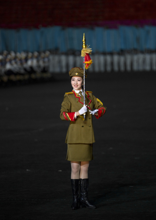 Sexy North Korean women dressed as soldiers dancing with swords during the Arirang mass games in may day stadium, Pyongan Province, Pyongyang, North Korea