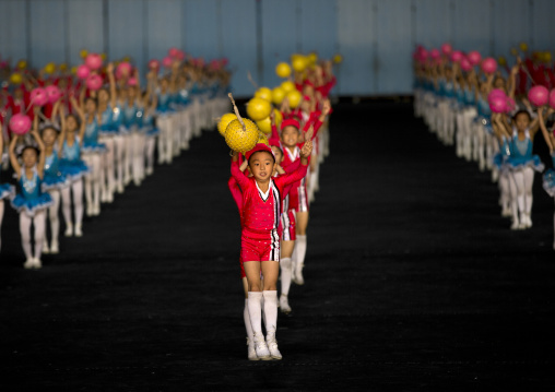 North Korean children performing with balloons during the Arirang mass games in may day stadium, Pyongan Province, Pyongyang, North Korea