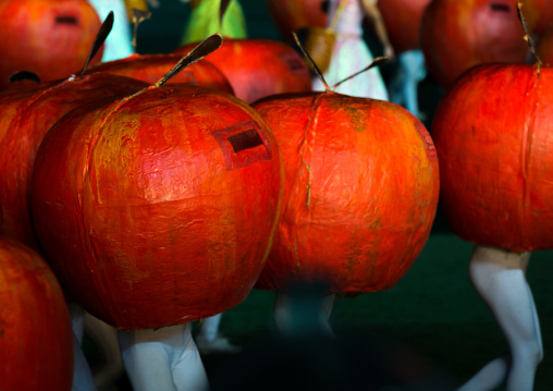 North Korean women dancing between apples during the Arirang mass games in may day stadium, Pyongan Province, Pyongyang, North Korea