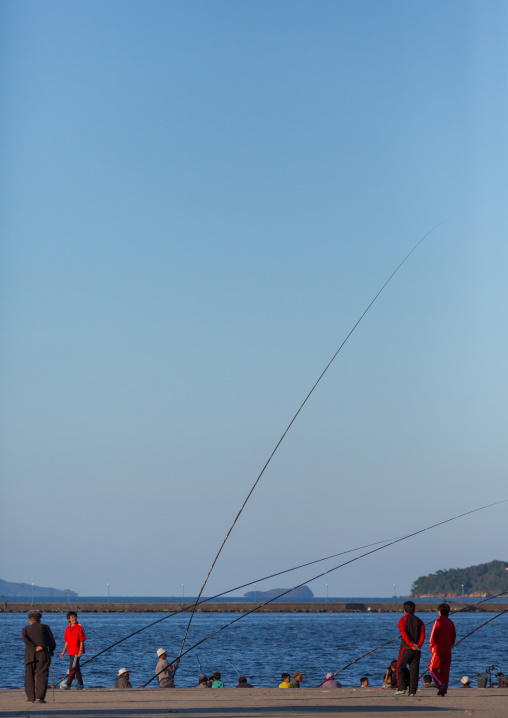 North Korean men fishing in the port, Kangwon Province, Wonsan, North Korea