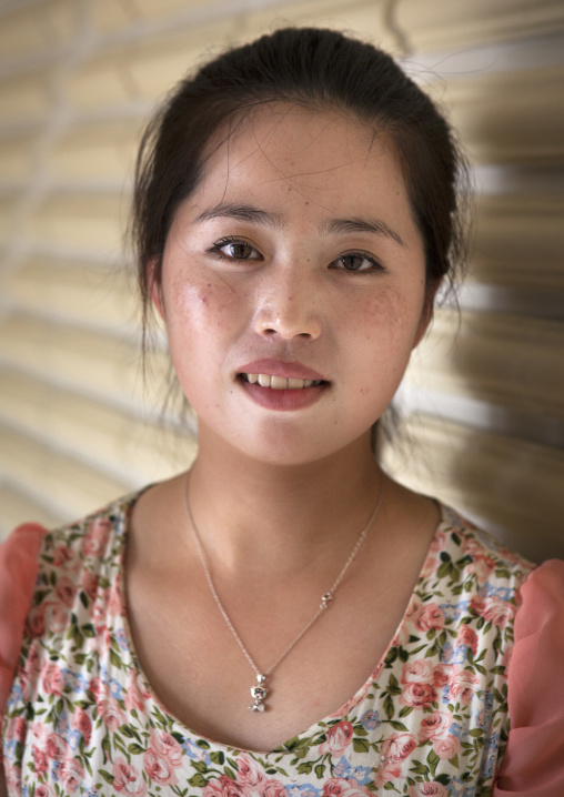 Portrait of a North Korean waitress in a restaurant, Pyongan Province, Pyongyang, North Korea