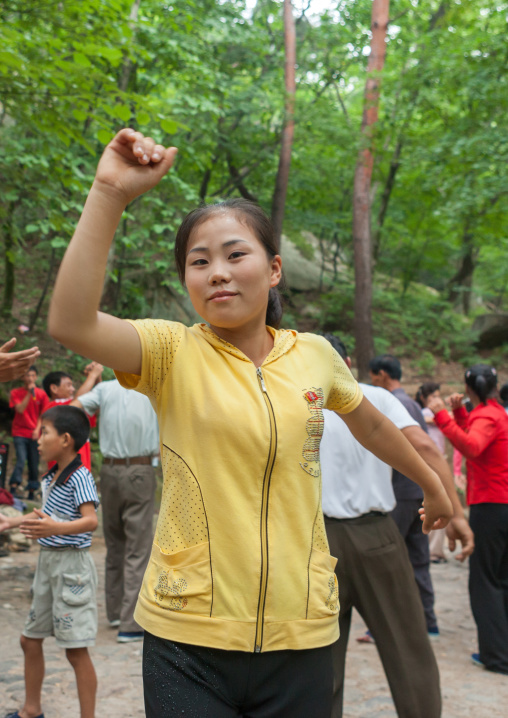 North Korean electricity company workers dancing in a park, North Hwanghae Province, Kaesong, North Korea
