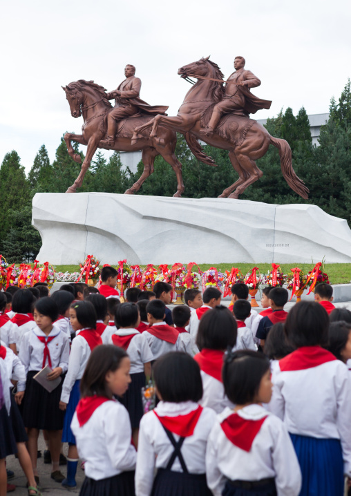 North Korean pioneers paying respect to the Leaders in Mansudae art studio, Pyongan Province, Pyongyang, North Korea