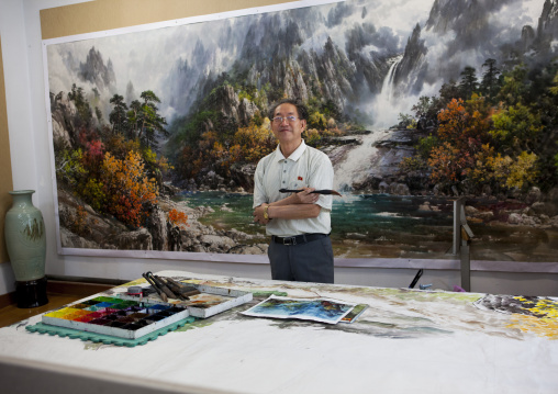 North Korean state artist in his workshop at Mansudae art studio, Pyongan Province, Pyongyang, North Korea