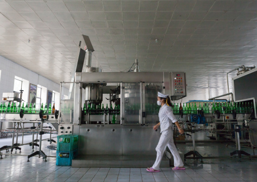 North Korean female worker in kangso yaksu mineral water factory, South Pyongan Province, Nampo, North Korea