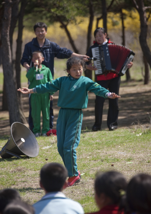 North Korean girl dancing in a summer camp, North Hamgyong Province, Chilbo Sea, North Korea