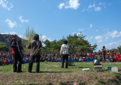 North Korean children singing in a park during a summer camp, North Hamgyong Province, Chilbo Sea, North Korea