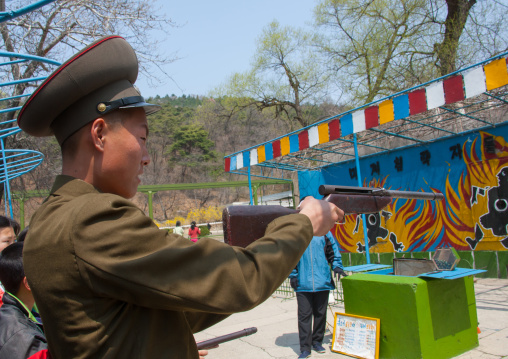 North Korean soldiers shooting at Taesongsan funfair, Pyongan Province, Pyongyang, North Korea