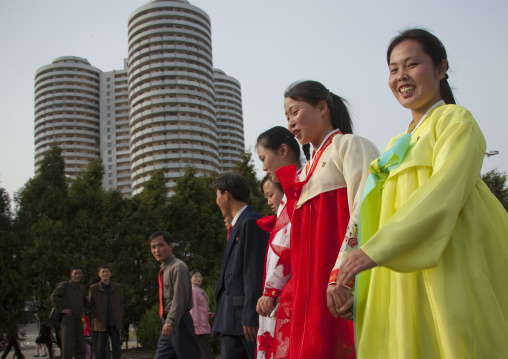 North Korean young adults during a mass dance performance in front of buildings on military foundation day, Pyongan Province, Pyongyang, North Korea