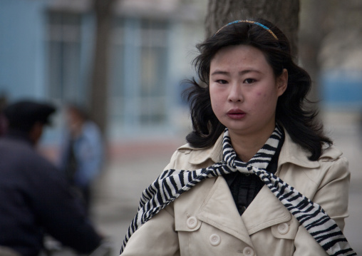 North Korean woman in western clothes in the street, North Hwanghae Province, Kaesong, North Korea