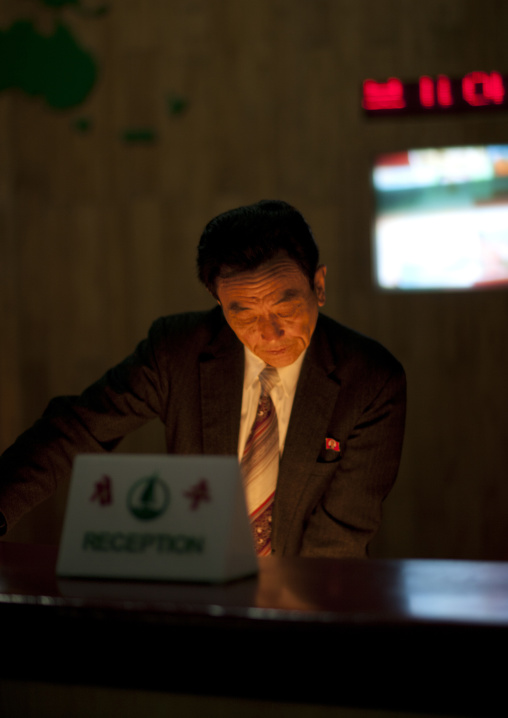 North Korean man at the reception of an hotel, Kangwon Province, Wonsan, North Korea