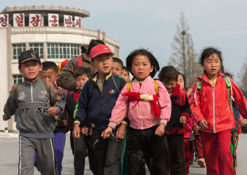 North Korean children parading in the streets on the international workers' day, Kangwon Province, Wonsan, North Korea