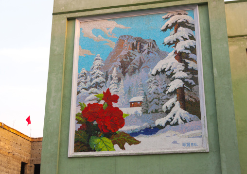 Kim Jong il's native home on a North Korean propaganda billboard, Pyongan Province, Pyongyang, North Korea