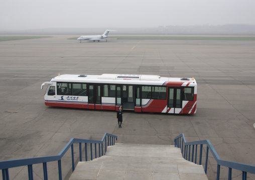 Bus on the tarmac of Pyongyang Sunan international airport, Pyongan Province, Pyongyang, North Korea