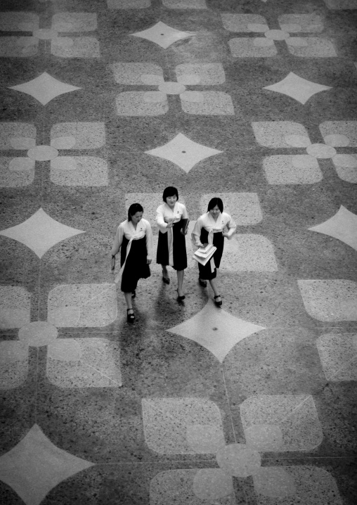 North Korean women walking in the Grand people's study house hall, Pyongan Province, Pyongyang, North Korea