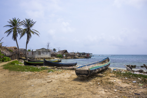 Panama, San Blas Islands, Mamitupu, Tropical Beach With Kuna Tribe Dugout Canoes On Sand