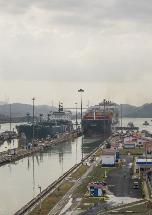 Panama, Province Of Panama, Panama City, Container Ship Passing Through The Miraflores Locks In The Panama Canal