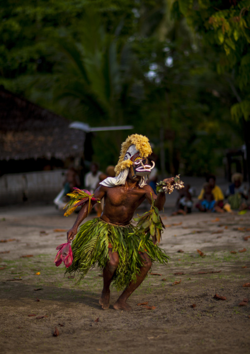 Malagan tatuana masks dance during a funeral ceremony, New Ireland Province, Langania, Papua New Guinea