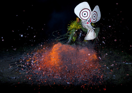 Dancer with a giant mask during a Baining tribe fire dance, East New Britain Province, Rabaul, Papua New Guinea