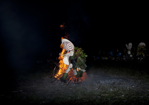 Dancer with a giant mask during a Baining tribe fire dance, East New Britain Province, Rabaul, Papua New Guinea