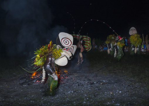 Dancer with a giant mask during a Baining tribe fire dance, East New Britain Province, Rabaul, Papua New Guinea