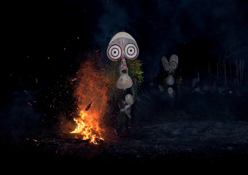 Dancer with a giant mask during a Baining tribe fire dance, East New Britain Province, Rabaul, Papua New Guinea