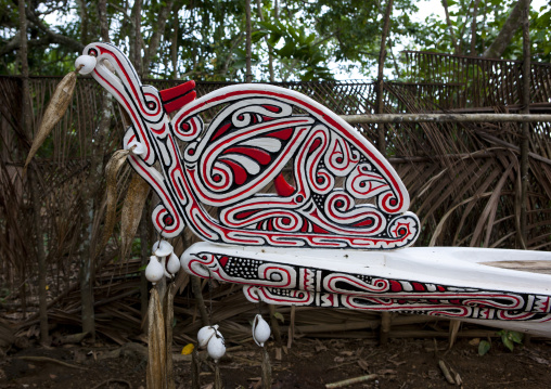 Traditional canoe with carved and painted decorations, Milne Bay Province, Alotau, Papua New Guinea