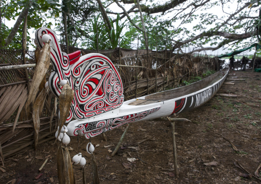 Traditional canoe with carved and painted decorations, Milne Bay Province, Alotau, Papua New Guinea