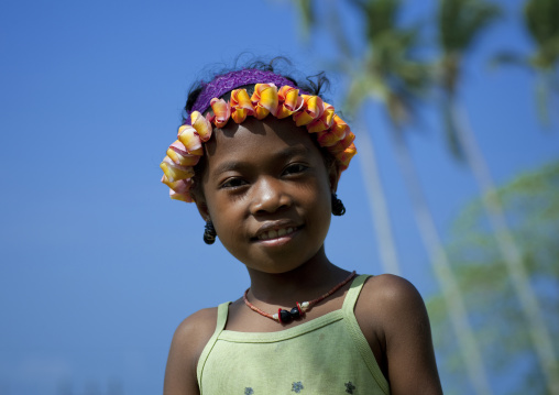 Portrait of a girl with flowers in the hair, Milne Bay Province, Trobriand Island, Papua New Guinea