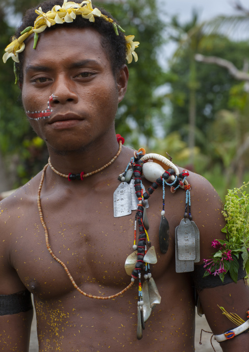 Man in traditional clothing during a ceremony, Milne Bay Province, Trobriand Island, Papua New Guinea