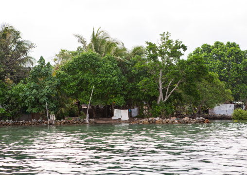 Protection against rising sea levels in a costal village, Autonomous Region of Bougainville, Bougainville, Papua New Guinea
