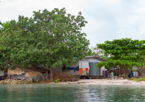 Protection against rising sea levels in a costal village, Autonomous Region of Bougainville, Bougainville, Papua New Guinea