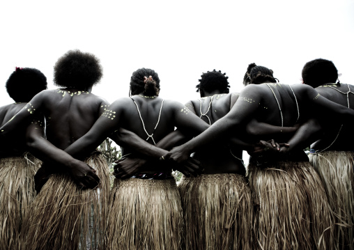 Women in traditional clothing dancing in line, Autonomous Region of Bougainville, Bougainville, Papua New Guinea