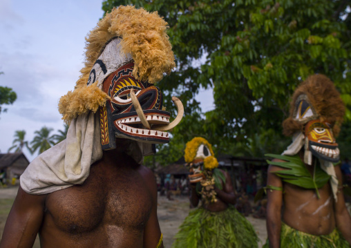 Malagan tatuana masks dance during a funeral ceremony, New Ireland Province, Langania, Papua New Guinea