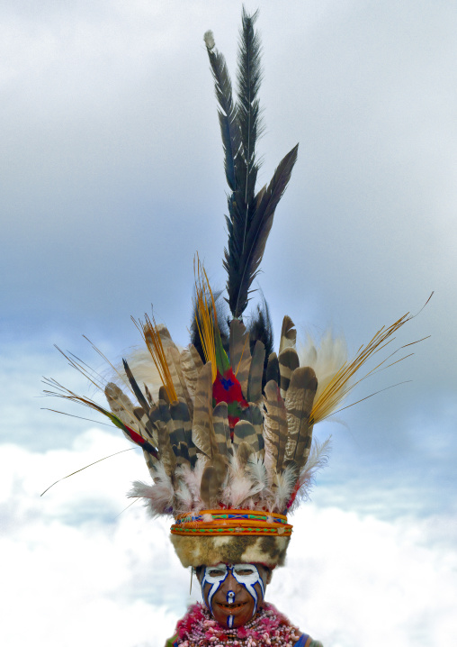 Portrait of a Highlander woman with a huge headwear during a sing-sing, Western Highlands Province, Mount Hagen, Papua New Guinea